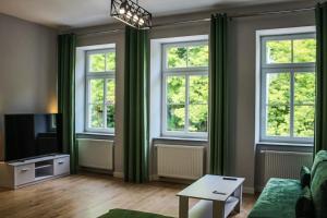 TV a/nebo společenská místnost v ubytování APARTAMENTY PRZY PARKU- Parking GRATIS!!!
