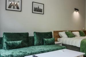 Postel nebo postele na pokoji v ubytování APARTAMENTY PRZY PARKU- Parking GRATIS!!!
