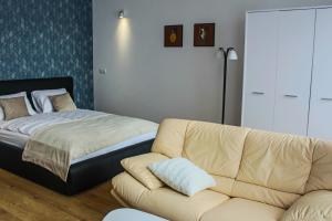 Postel nebo postele na pokoji v ubytování APARTAMENTY PRZY PARKU- Parking GRATIS!!!