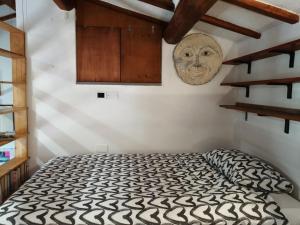 Posteľ alebo postele v izbe v ubytovaní Casa Gianfranco Millepapaverirossi