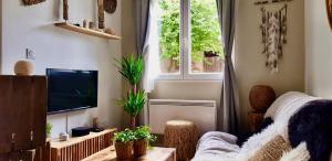 TV a/nebo společenská místnost v ubytování Casa Tulum