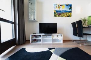 TV a/nebo společenská místnost v ubytování Villa Floris