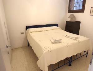 En eller flere senge i et værelse på Elisabeth Waterfront Apartment