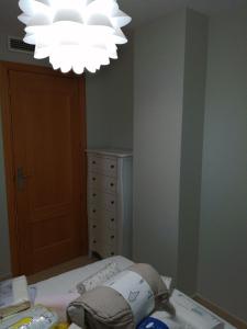 Postel nebo postele na pokoji v ubytování RESIDENCIAL LAS PALMERAS