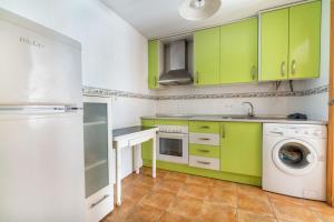 Kuchyň nebo kuchyňský kout v ubytování RESIDENCIAL LAS PALMERAS