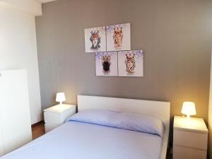 Posteľ alebo postele v izbe v ubytovaní Saracena Amuri Home