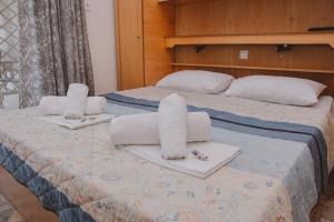 Posteľ alebo postele v izbe v ubytovaní Apartments Tania