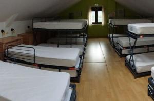 Postel nebo postele na pokoji v ubytování Albergue rural l'Almada de Yebra