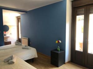 Postel nebo postele na pokoji v ubytování Albergue rural l'Almada de Yebra