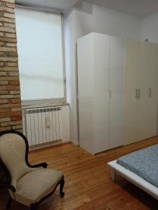 Postel nebo postele na pokoji v ubytování Il piccolo loft