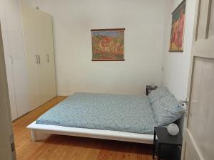 Postel nebo postele na pokoji v ubytování Il piccolo loft
