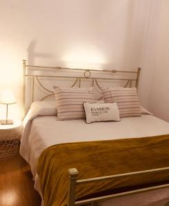 a bedroom with a bed with a pillow on it at Casa relax in Collegno