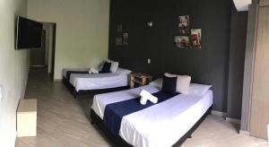 Letto o letti in una camera di Apartahotel Avanti