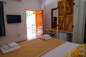 Postel nebo postele na pokoji v ubytování merih butik hotel