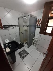 Ванная комната в Casas Ferrugem-Garopaba