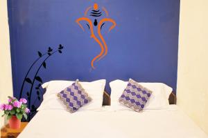 Postel nebo postele na pokoji v ubytování RELAX PAYING GUEST HOUSE