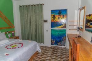 Postel nebo postele na pokoji v ubytování Chao Guest House