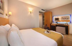 Postel nebo postele na pokoji v ubytování Almina Hotel - Special Class