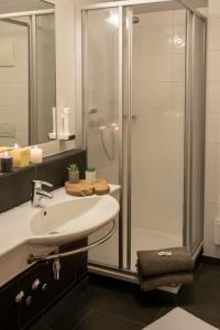 Koupelna v ubytování Hotel Auwirt Zentrum