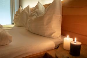 Postel nebo postele na pokoji v ubytování Hotel Auwirt Zentrum