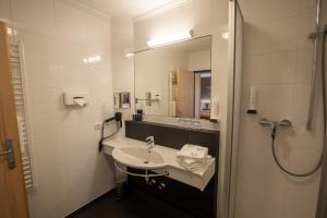 Koupelna v ubytování Hotel Auwirt Zentrum