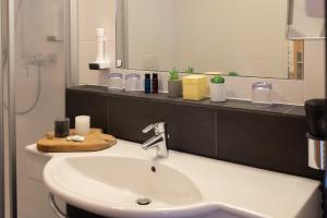 Koupelna v ubytování Hotel Auwirt Zentrum