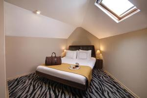 Postel nebo postele na pokoji v ubytování Almina Hotel - Special Class