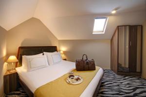 Postel nebo postele na pokoji v ubytování Almina Hotel - Special Class