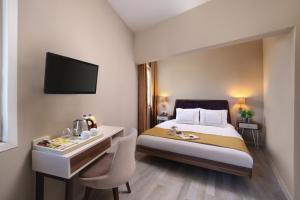 Postel nebo postele na pokoji v ubytování Almina Hotel - Special Class