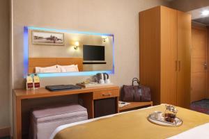 Postel nebo postele na pokoji v ubytování Almina Hotel - Special Class