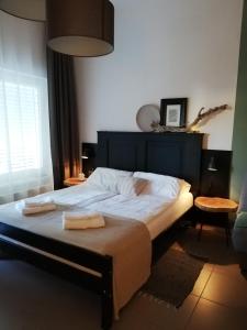 Postel nebo postele na pokoji v ubytování MAPLE place + 37 fotografií