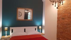 Posteľ alebo postele v izbe v ubytovaní H&T Old Town Szeroka 36