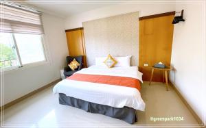 Postel nebo postele na pokoji v ubytování Green Park Homestay