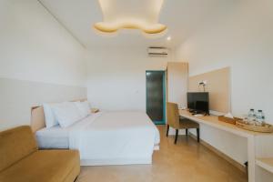 Postel nebo postele na pokoji v ubytování Birru Inn