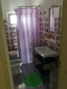 Een badkamer bij Villa Mare Verde