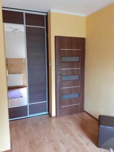 Noclegi Pod Dębem, Pulandia Brzózki客房内的一张或多张床位