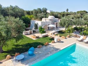Bazén v ubytování B&B Trulli Moonlight da Grace nebo v jeho okolí
