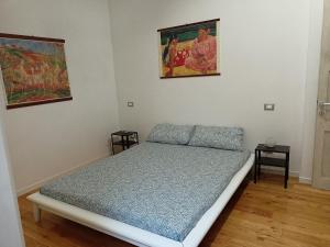 Postel nebo postele na pokoji v ubytování Il piccolo loft