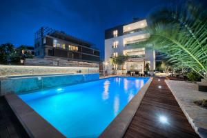 Bazén v ubytování Liberty Living Apartments nebo v jeho okolí