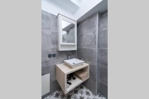 Koupelna v ubytování Maisonnette Giannis + 12 fotografií