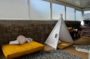 a room with a couch with a tent in it at SAVANNAH in Saint Malo +23 photos