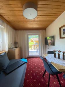 Posedenie v ubytovaní Ferienwohnungen am Riedanger