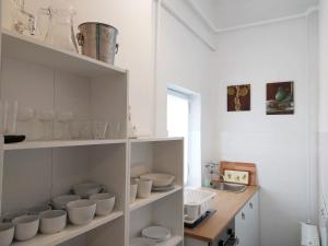 Kuchyň nebo kuchyňský kout v ubytování Atelier Keszthely