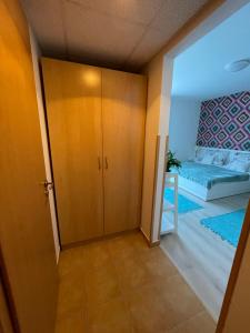 Postel nebo postele na pokoji v ubytování Joy Apartman