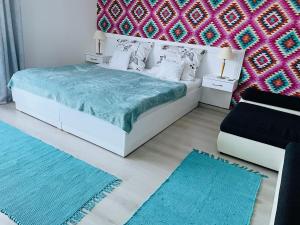 Posteľ alebo postele v izbe v ubytovaní Joy Apartman + 34 fotografií