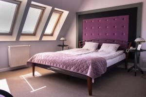 Postel nebo postele na pokoji v ubytování Hotel Marmułowski