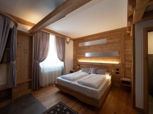 Säng eller sängar i ett rum på Agritur Golden Pause