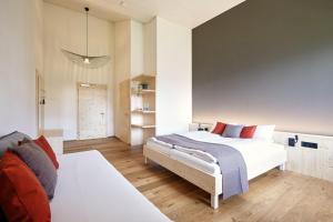 Krevet ili kreveti u jedinici u okviru objekta Hotel Klausenpass