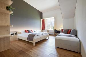 Krevet ili kreveti u jedinici u okviru objekta Hotel Klausenpass