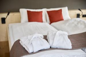 Krevet ili kreveti u jedinici u okviru objekta Hotel Klausenpass